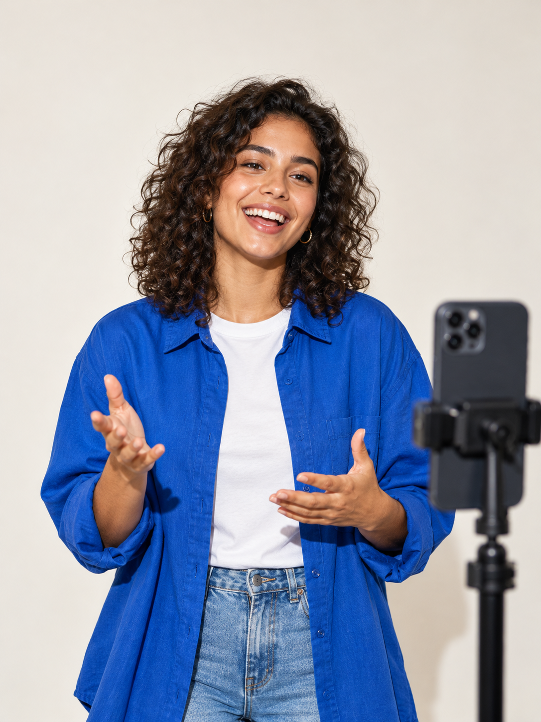 A creator recording a video on a smartphone